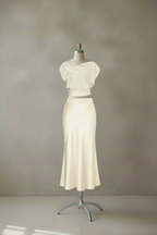 Cream two-piece set back view on mannequin