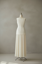 Off-white pleated maxi dress back view on mannequin