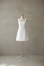 White dress with thicker straps on mannequin